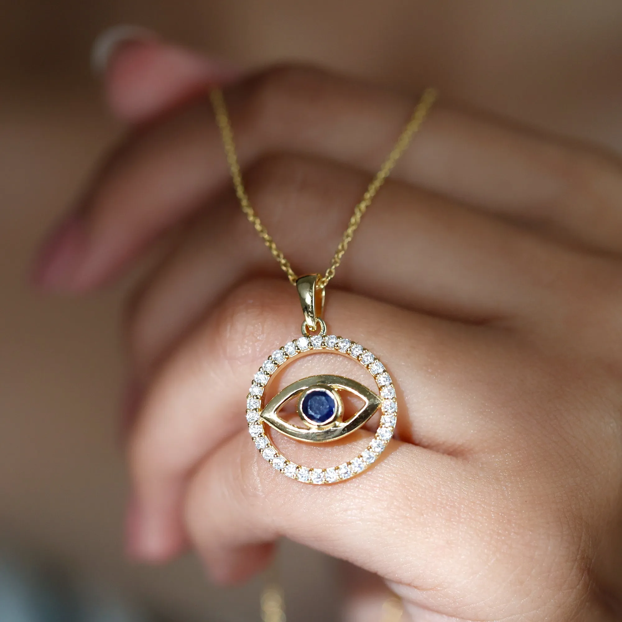 1.25 CT Blue Sapphire and Diamond Evil Eye Eternity Pendant