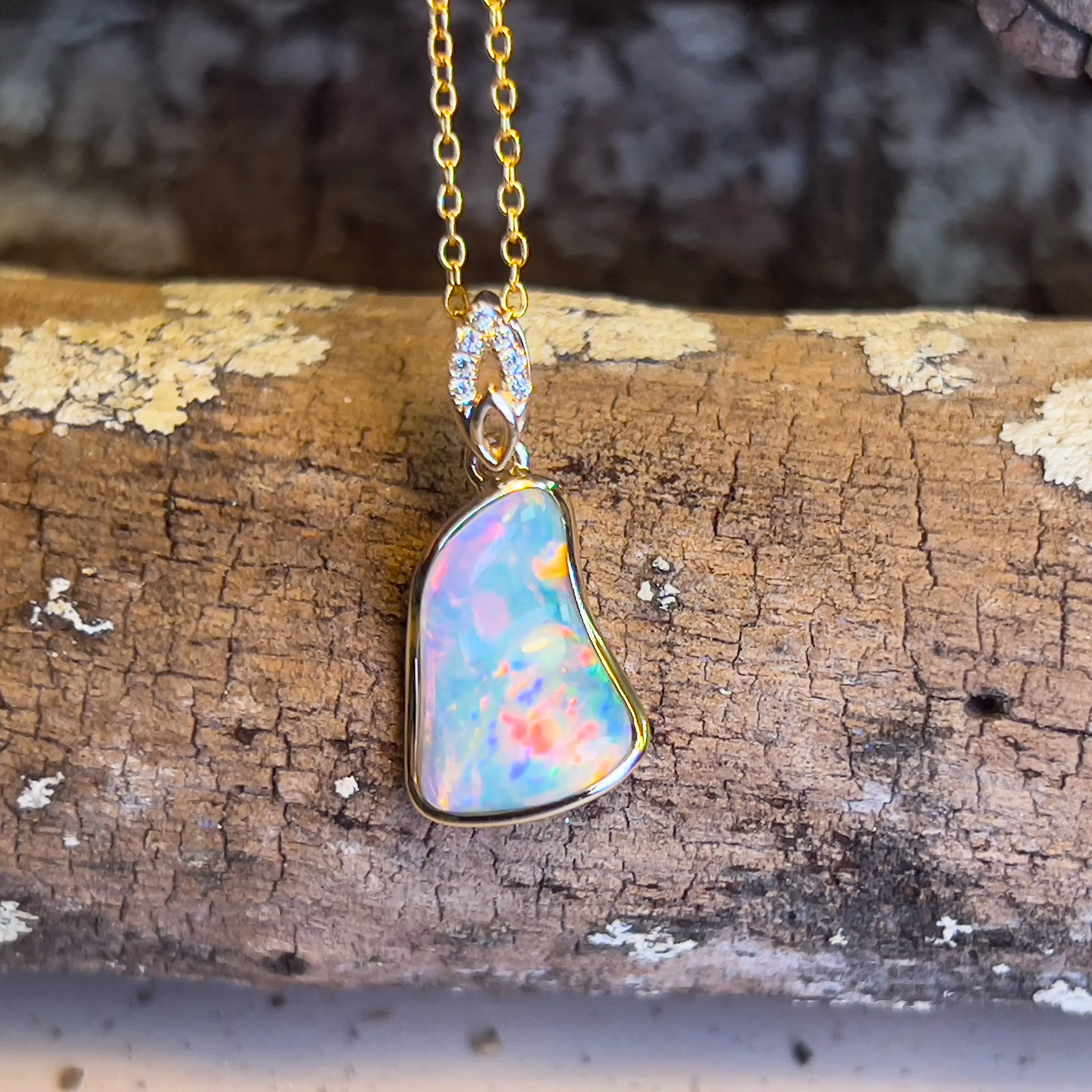 14kt Yellow Gold freeform Crystal Opal 1.5ct and diamond pendant