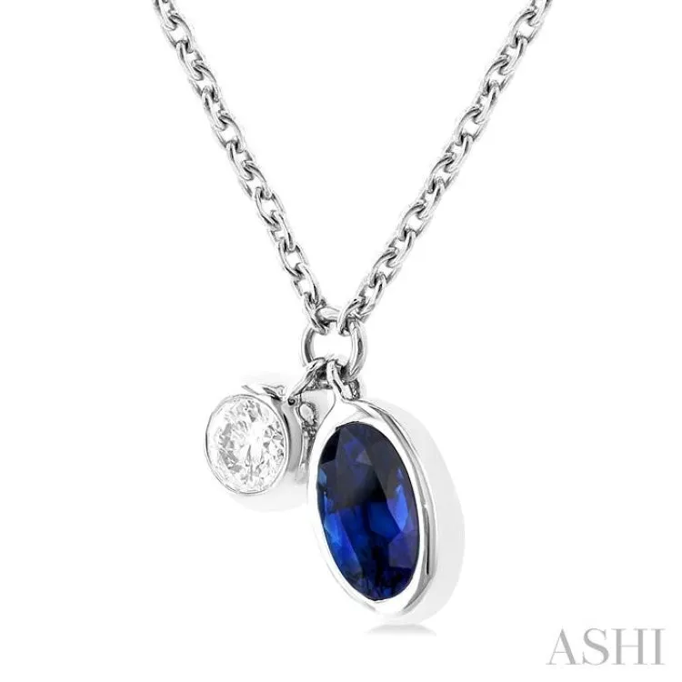 1/50 ctw Oval Cut 6X4MM sapphire and Bezel Set Round Cut Diamond Precious Necklace in 10K White Gold