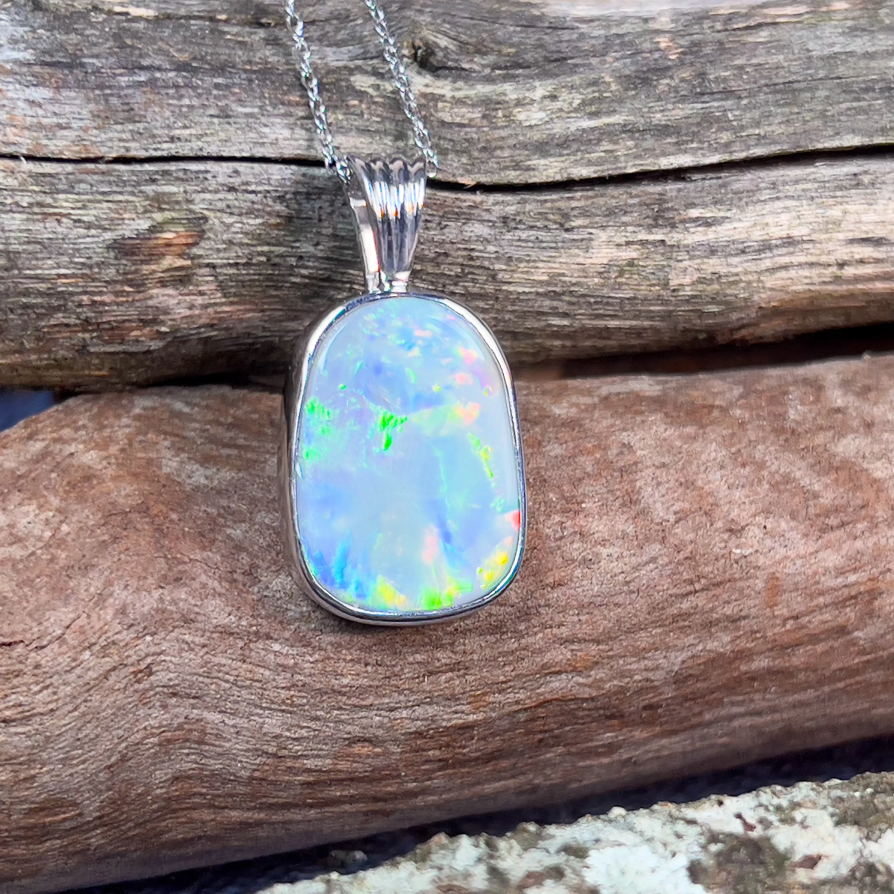 18kt White Gold Enhancer pendant with Black Opal 10.02ct bezel set