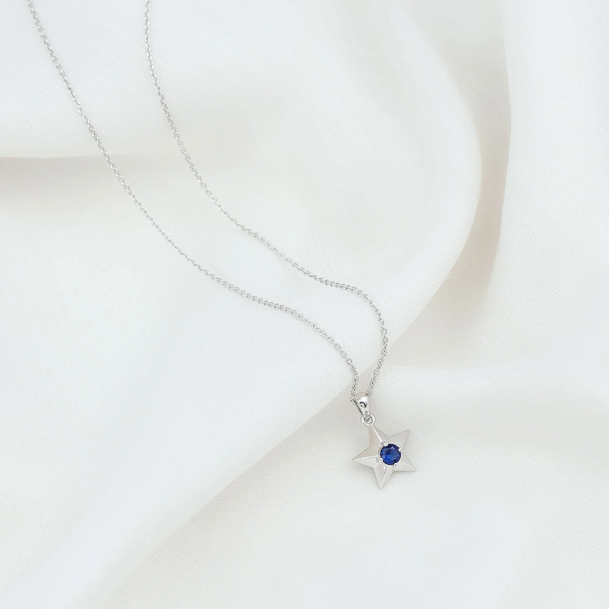 Created Blue Sapphire Star Pendant Necklace