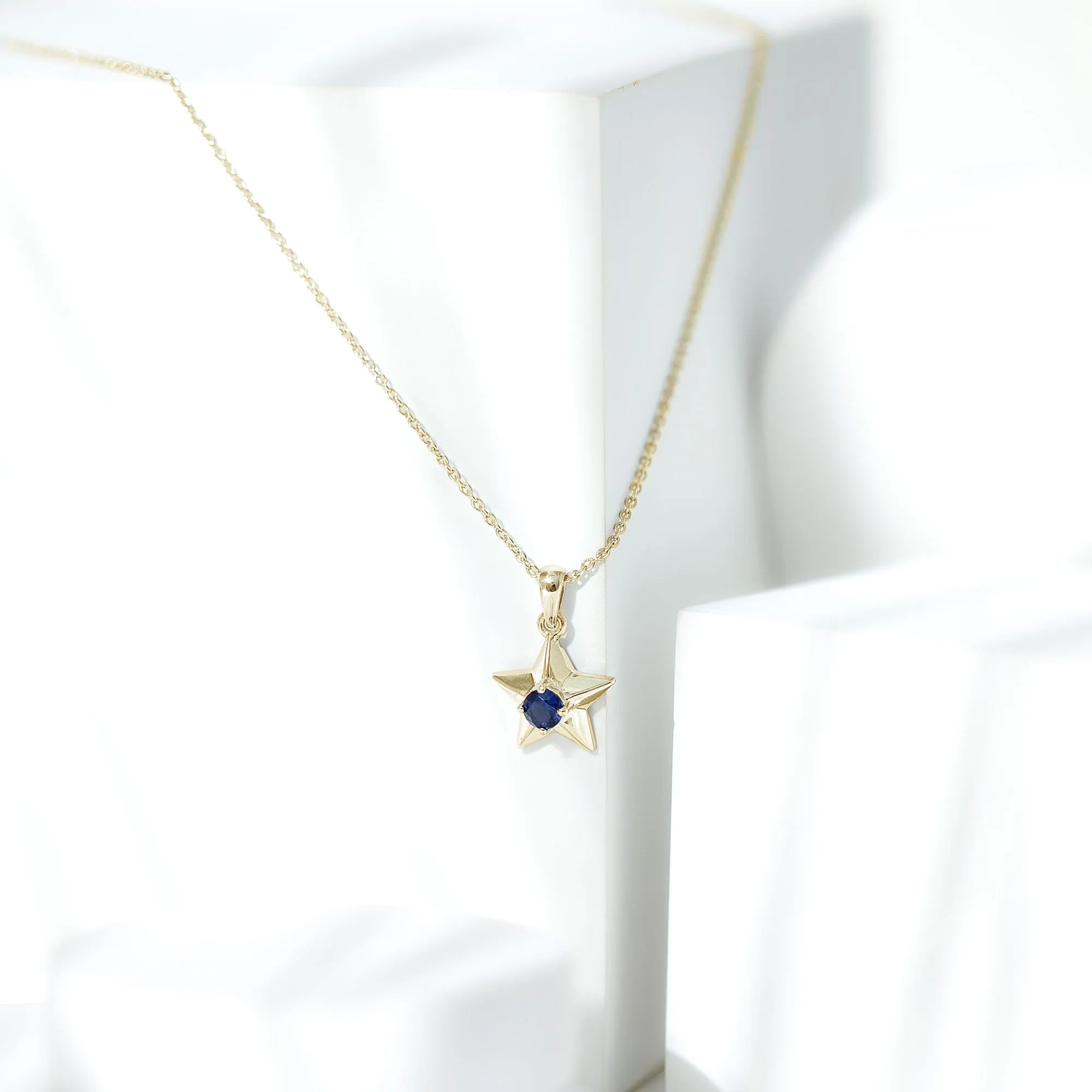 Created Blue Sapphire Star Pendant Necklace