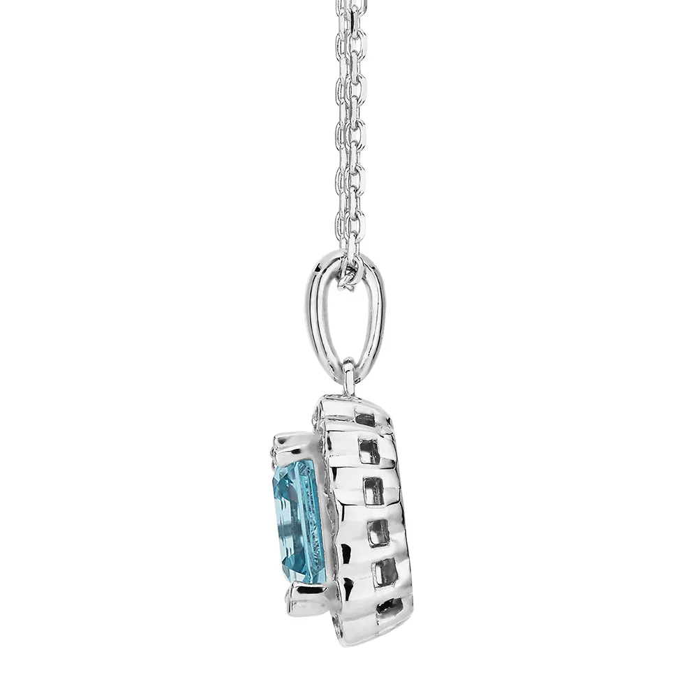 Halo necklace with blue topaz simulant in sterling silver