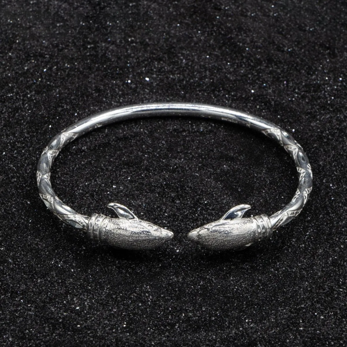 Heavy  Bangle with Dolphins with Diamante Pattern