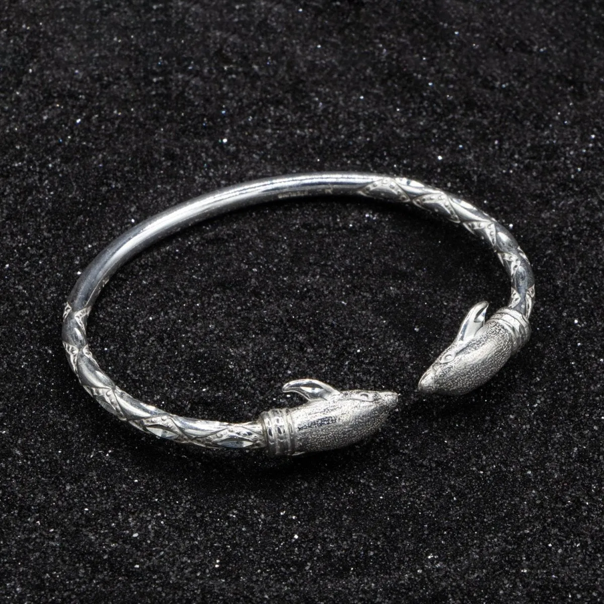 Heavy  Bangle with Dolphins with Diamante Pattern